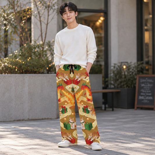 Man wearing Christmas dragon and cats print pajama pants with gifts and string lights